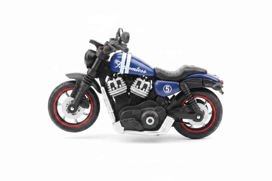 Fathomless blue black cruiser motorcycle side view white background