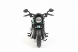 Fathomless green black cruiser motorcycle front view white background