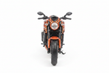 Orange black cruiser motorcycle front view white background